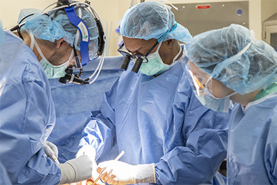 surgeons performing surgery