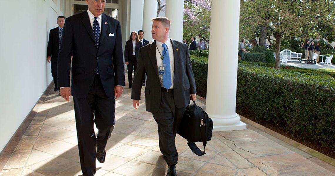 President Joseph R. Biden Jr. walks with new Physician to the President Kevin O'Connor, DO