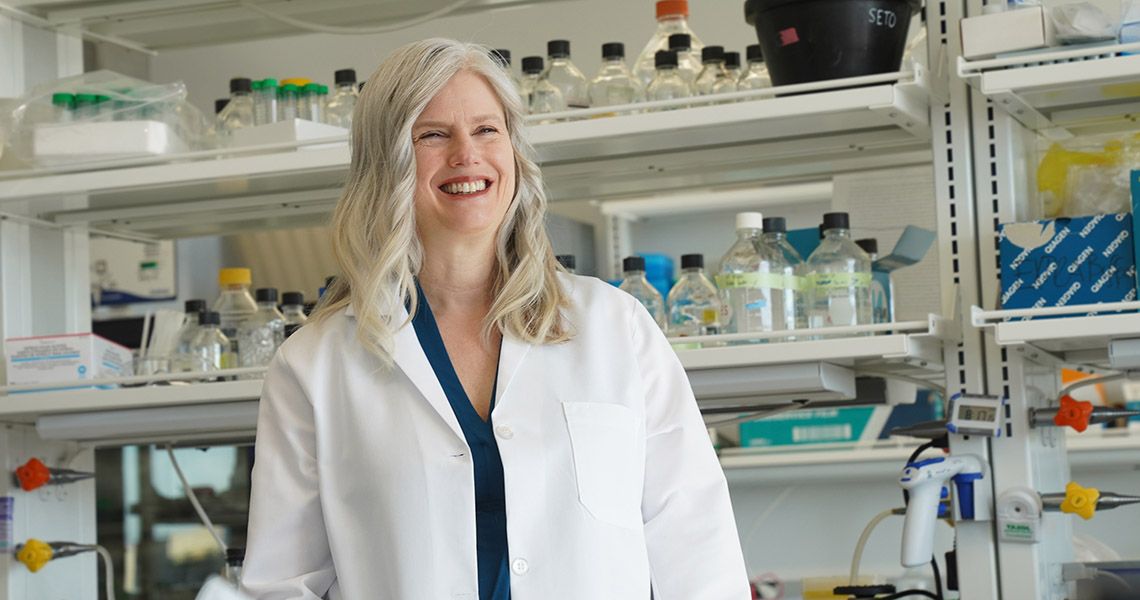 Julie E. Bauman, MD, MPH, is shown in her lab