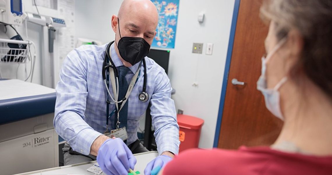 David Diemert treats a patient