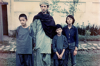Family photo of a young Aziz-Sultan in Afghanistan