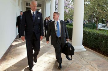 President Joseph R. Biden Jr. walking with Physician to the President Kevin O'Connor, DO.
